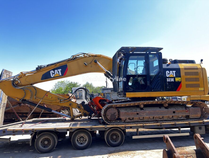 Caterpillar CL320 bager guseničar