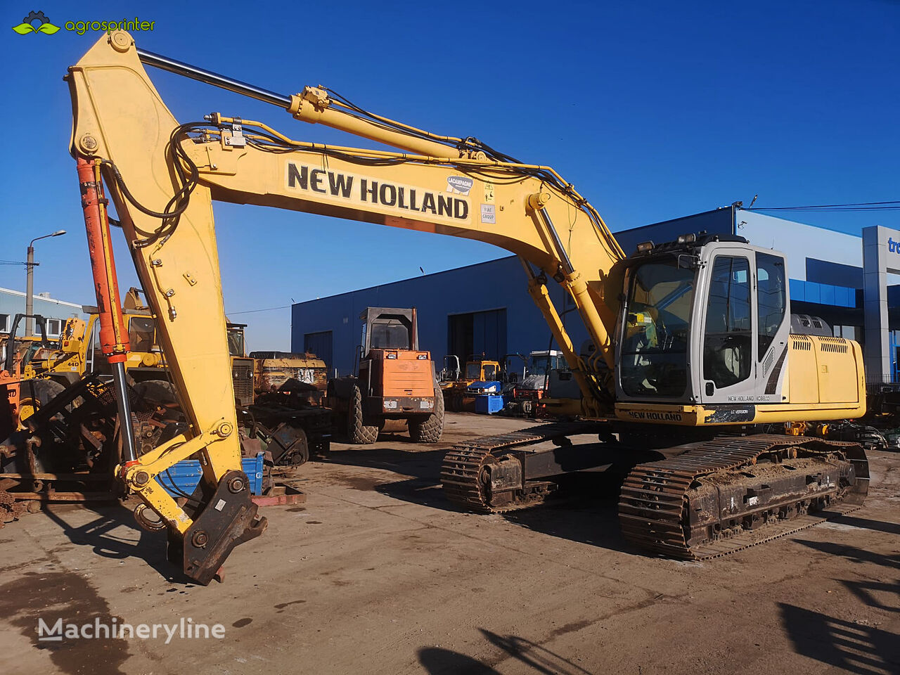 New Holland E215B bager guseničar