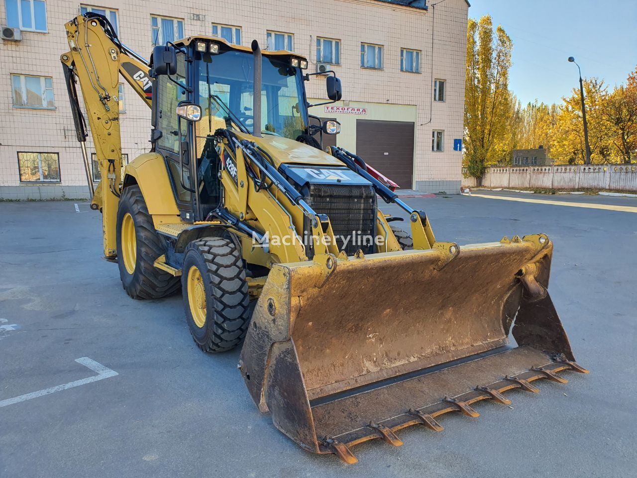 Caterpillar 428 F2 bager-utovarivač